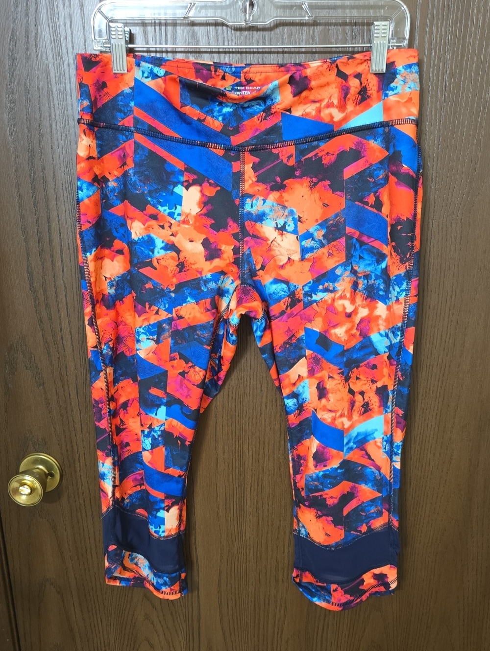Tek gear Neon Orange & Blue Geometric Capri Leggings, Large.